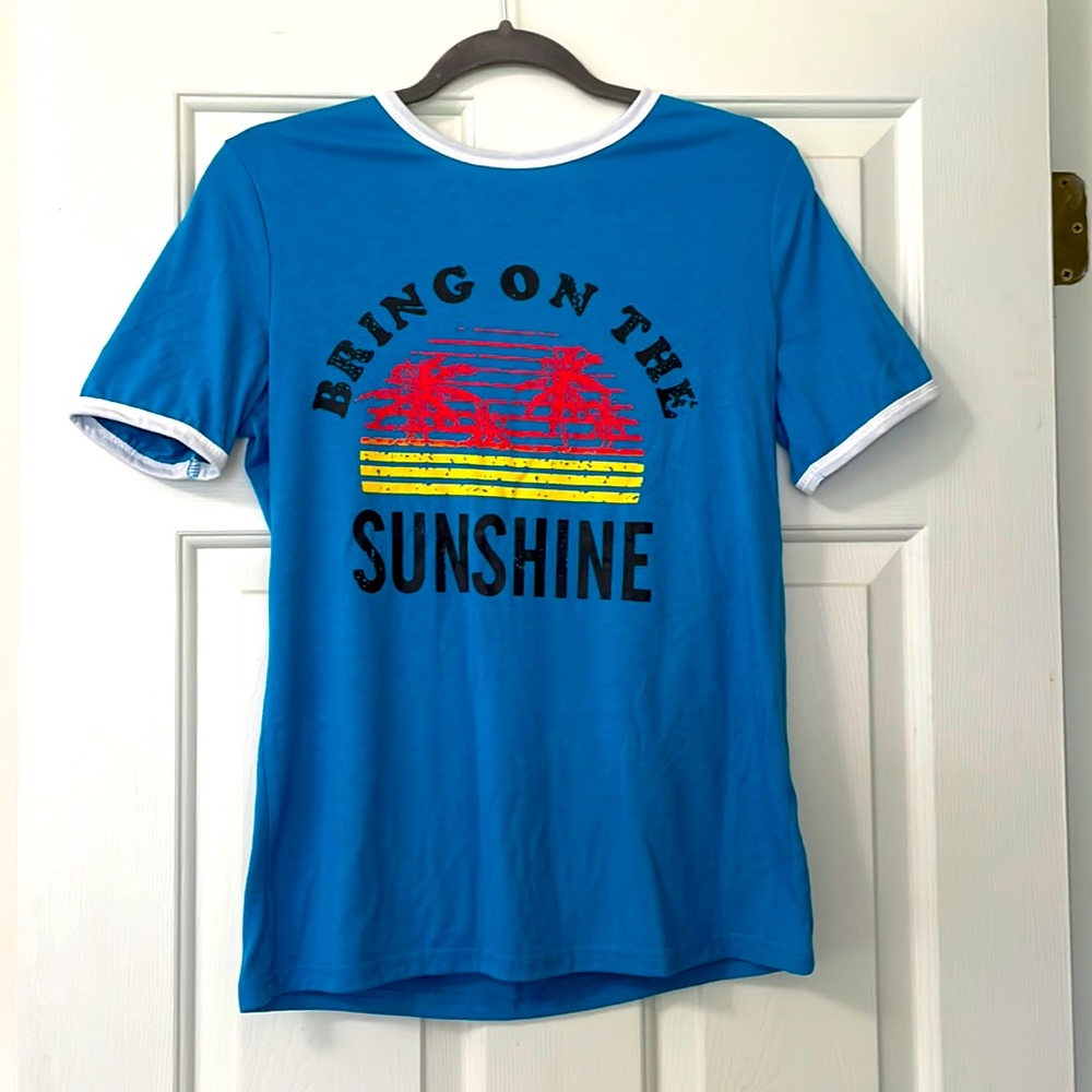 Fun shirt for summer.  Size small, but runs bigger.